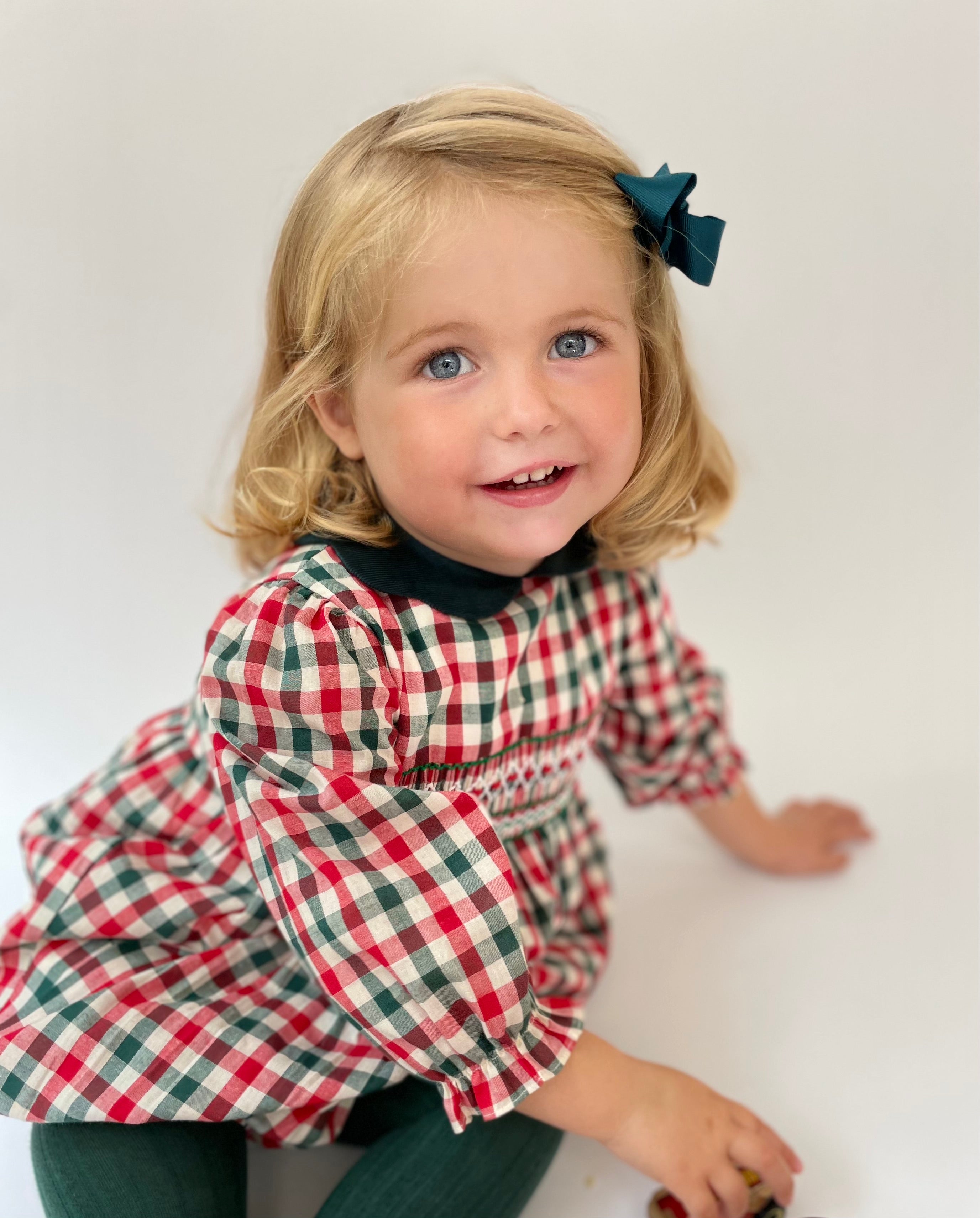 Hand smocked romper collection image for Autumn for Lallie London smocked dresses and hand smocked rompers. Smocked dresses for all occasions designed in london. Traditional children's clothes.